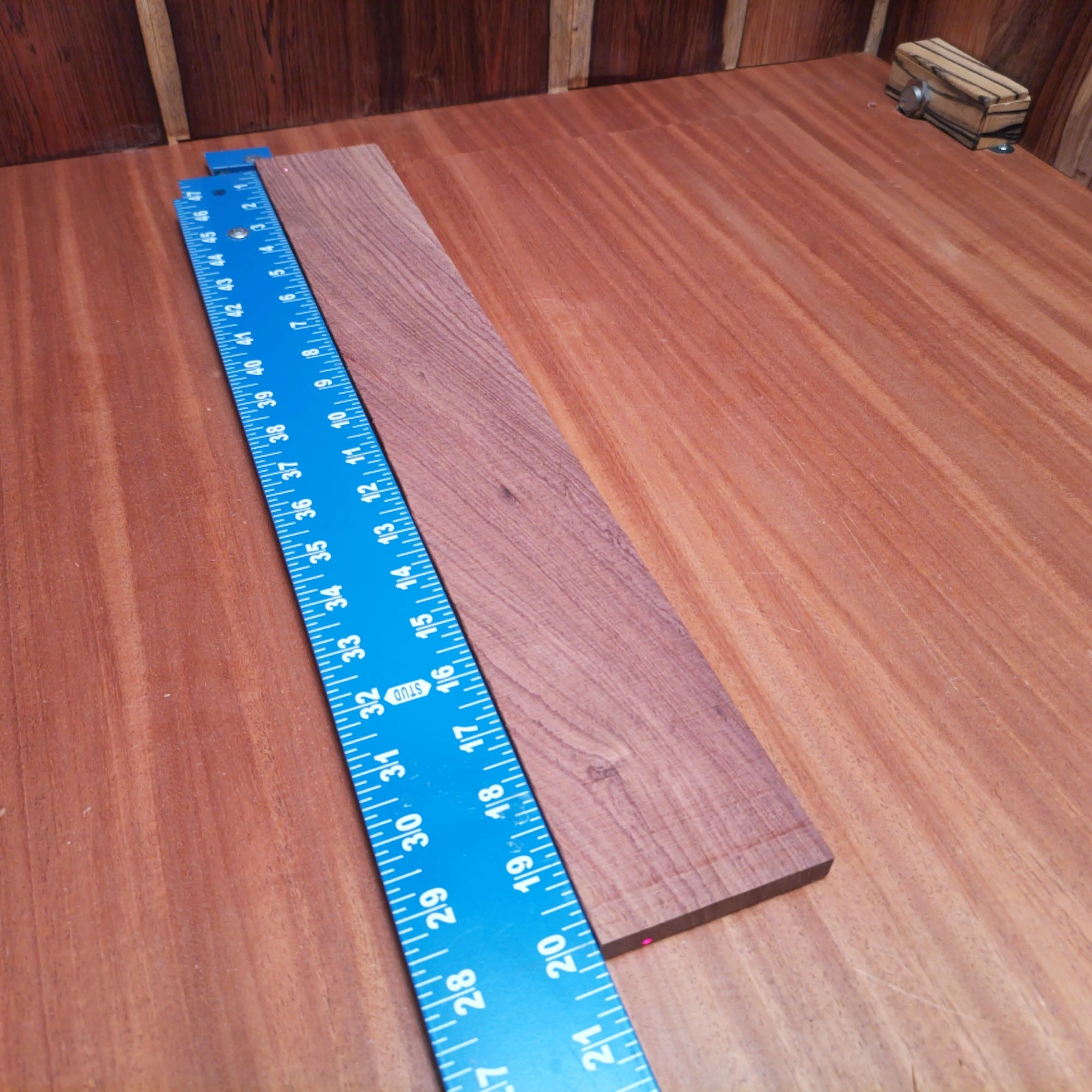Honduran Rosewood Acoustic Rift Sawn Fingerboard Blank 0.4" X 2.9" X 20.1" - HRAFBR000319 1 Unlock your creativity with this Honduran Rosewood fingerboard blank, perfect for crafting stunning acoustic instruments. Its gorgeous grain and rich tonal qualities make it an essential choice for serious luthiers. Whether you're producing a classic guitar or an innovative design, this premium blank offers durability and resonance, ensuring awesome sound quality and aesthetic appeal. Elevate your projects with this beautiful wood today! It is a Honduran Rosewood Acoustic Rift Sawn fingerboard blank with dimensions of 20.1 x 2.9 x 0.4 inches.