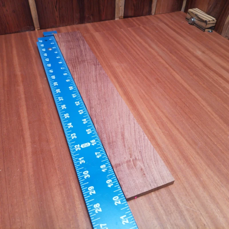 Honduran Rosewood Acoustic Rift Sawn Fingerboard Blank 0.4" X 2.9" X 20.1" - HRAFBR000319 3 Unlock your creativity with this Honduran Rosewood fingerboard blank, perfect for crafting stunning acoustic instruments. Its gorgeous grain and rich tonal qualities make it an essential choice for serious luthiers. Whether you're producing a classic guitar or an innovative design, this premium blank offers durability and resonance, ensuring awesome sound quality and aesthetic appeal. Elevate your projects with this beautiful wood today! It is a Honduran Rosewood Acoustic Rift Sawn fingerboard blank with dimensions of 20.1 x 2.9 x 0.4 inches.