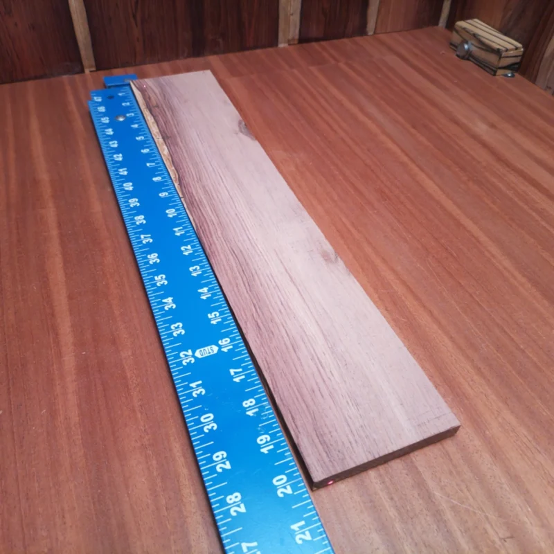 Craft your masterpiece with this Honduran Rosewood fingerboards blank, perfect for luthiers seeking quality. Its dense grain offers warm tones, enhancing sound projection and resonance. Built for durability and beauty, this blank allows for intricate designs and smooth playability. Elevate your instrument craftsmanship with a material that speaks versatility and elegance. Your next guitar project deserves the best foundation! It is a Honduran Rosewood Acoustic Rift Sawn fingerboard blank with dimensions of 20.1 x 3.8 x 0.4 inches.