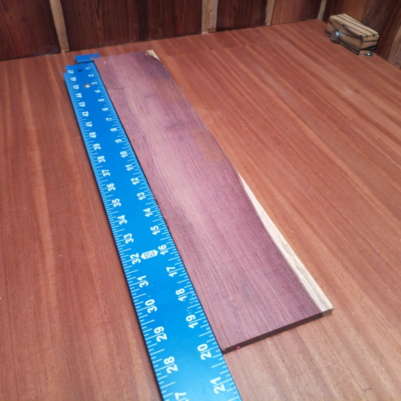 Crafted from premium Honduran Rosewood, this fingerboard blank offers a stunning combination of beauty and functionality. Its rift-sawn design ensures consistent grain patterns, perfect for luthiers seeking remarkable tone and easy playability. Ideal for acoustic instruments, this blank adds warmth and resonance that elevates any project. Upgrade your luthier tools with this fine quality wood and create unforgettable sound experiences! It is a Honduran Rosewood Acoustic Rift Sawn fingerboard blank with dimensions of 20.1 x 3.9 x 0.4 inches.