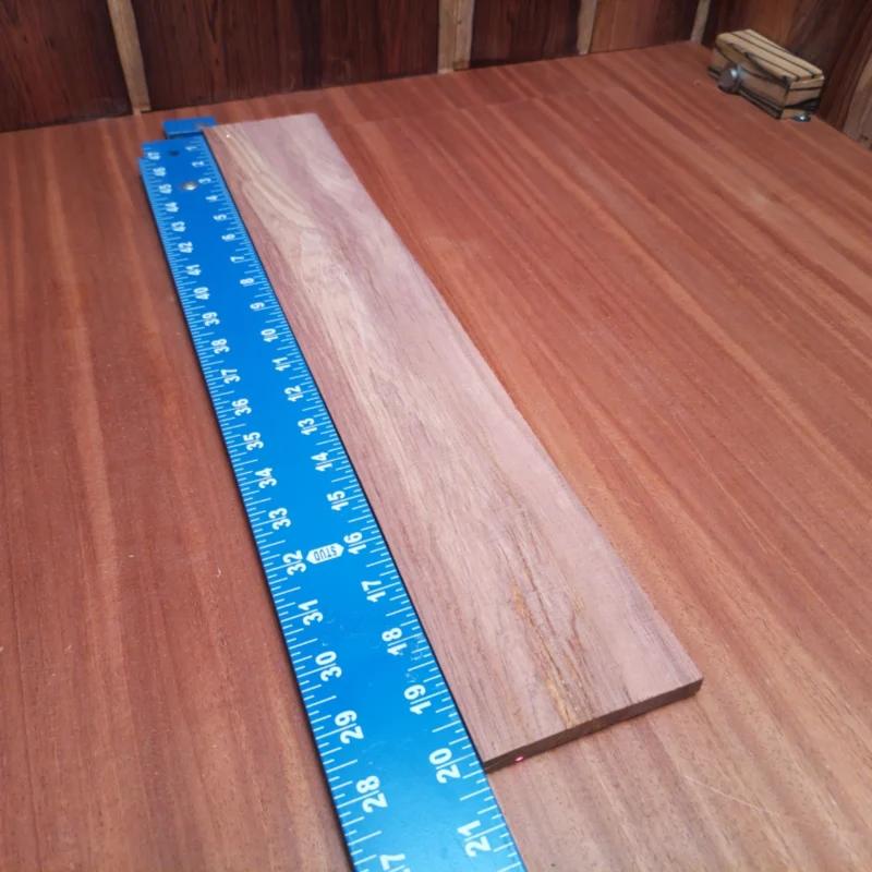 Crafted from premium Honduran Rosewood, this fingerboard blank is ideal for luthiers seeking quality and beauty. Its rift-sawn finish ensures a consistent grain pattern, making your acoustic instruments stand out. Easy to carve and shape, this blank provides excellent tonal qualities while enhancing fretboard aesthetics. Level up your craftsmanship with this reliable and stylish material that musicians will admire! It is a Honduran Rosewood Acoustic Rift Sawn fingerboard blank with dimensions of 20.1 x 3.4 x 0.4 inches.