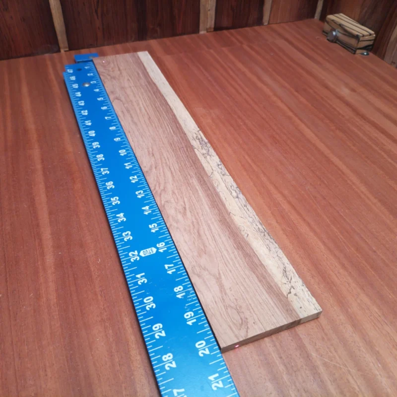 Honduran Rosewood Acoustic Rift Sawn Fingerboard Blank 0.4" X 3.6" X 20.1" - HRAFBR000333 3 Unlock the potential of your next acoustic project with our Honduran Rosewood blank. This premium, rift sawn wood offers excellent tonal quality and stunning aesthetics. Perfect for luthiers seeking to elevate their guitars, it features rich tones and a beautiful grain pattern. Whether crafting a masterpiece or refining your skills, this blank ensures remarkable resonance and durability. It is a Honduran Rosewood Acoustic Rift Sawn fingerboard blank with dimensions of 20.1 x 3.6 x 0.4 inches.