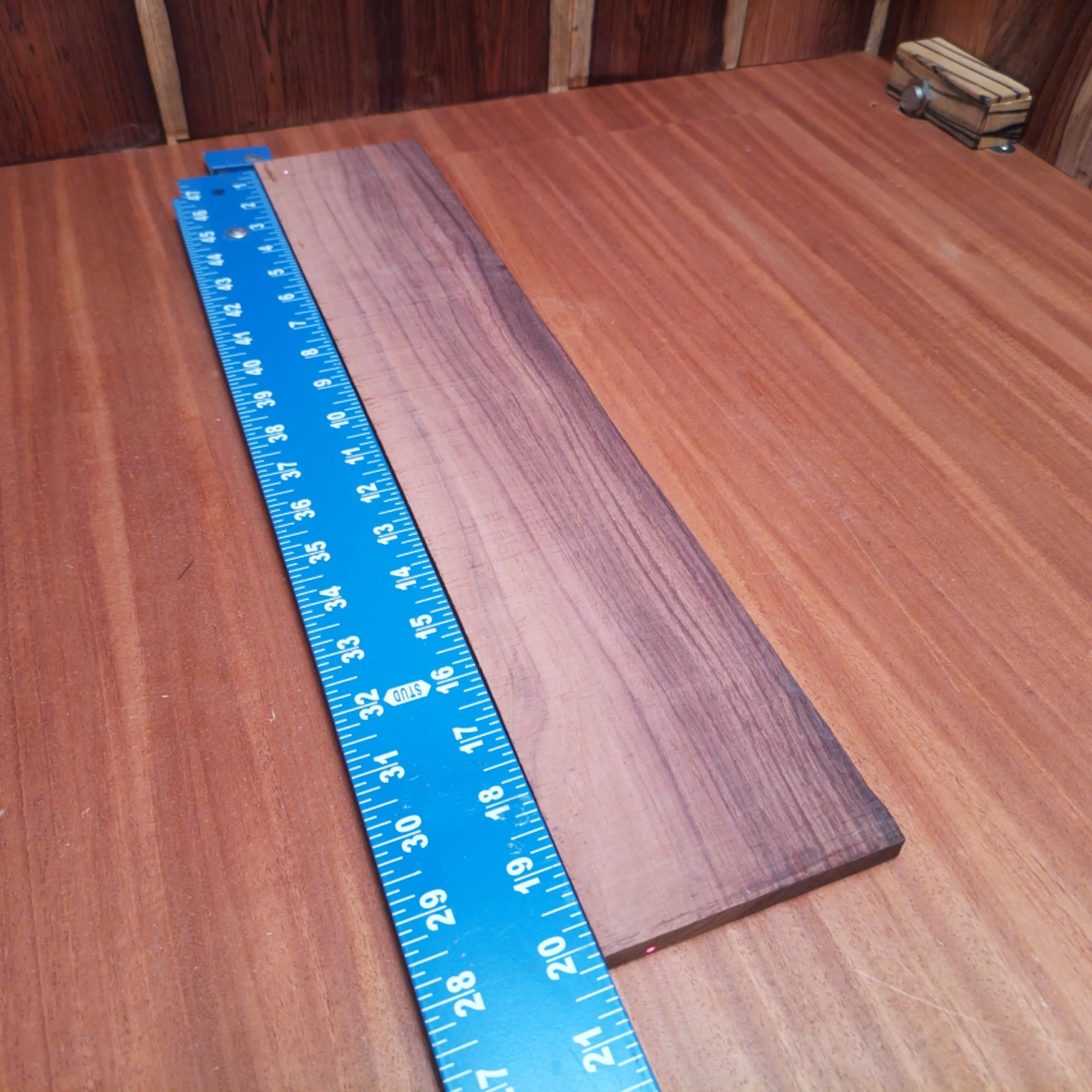 Honduran Rosewood Acoustic Rift Sawn Fingerboard Blank 0.4" X 3.9" X 20.1" - HRAFBR000334 2 Elevate your next acoustic creation with our Honduran Rosewood blank. Known for its striking grain and rich tonal qualities, this rift-sawn piece is perfect for luthiers seeking both beauty and performance. Its balanced density ensures excellent resonance, while the smooth finish allows for effortless shaping. Take your craft to the next level, whether you're building guitars or other stringed instruments. It is a Honduran Rosewood Acoustic Rift Sawn fingerboard blank with dimensions of 20.1 x 3.9 x 0.4 inches.