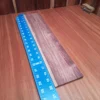 Experience the rich tones and stunning aesthetics of this Honduran Rosewood fingerboard blank. Perfect for luthiers, this premium material is known for its durability, beautiful grain patterns, and harmonic resonance. Whether you're crafting a new acoustic masterpiece or upgrading an existing instrument, this fingerboard blank will elevate your craft and deliver a sound that's both warm and vibrant. Grab yours now to unleash creativity on your next project! It is a Honduran Rosewood Acoustic Rift Sawn fingerboard blank with dimensions of 20.1 x 4.0 x 0.4 inches.