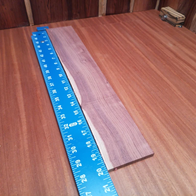 Honduran Rosewood Acoustic Rift Sawn Fingerboard Blank 0.4" X 3.4" X 20.1" - HRAFBR000345 3 Unlock your creativity with this premium Honduran Rosewood blank, perfect for crafting the ultimate acoustic instruments. Its rich color and resonant properties make it a favorite among luthiers for custom builds. Explore new soundscapes and enhance your guitar's tone with this high-quality material. Whether you're a seasoned luthier or a passionate hobbyist, this wood will take your projects to the next level. Get ready to impress with superior craftsmanship and breathtaking sound! It is a Honduran Rosewood Acoustic Rift Sawn fingerboard blank with dimensions of 20.1 x 3.4 x 0.4 inches.