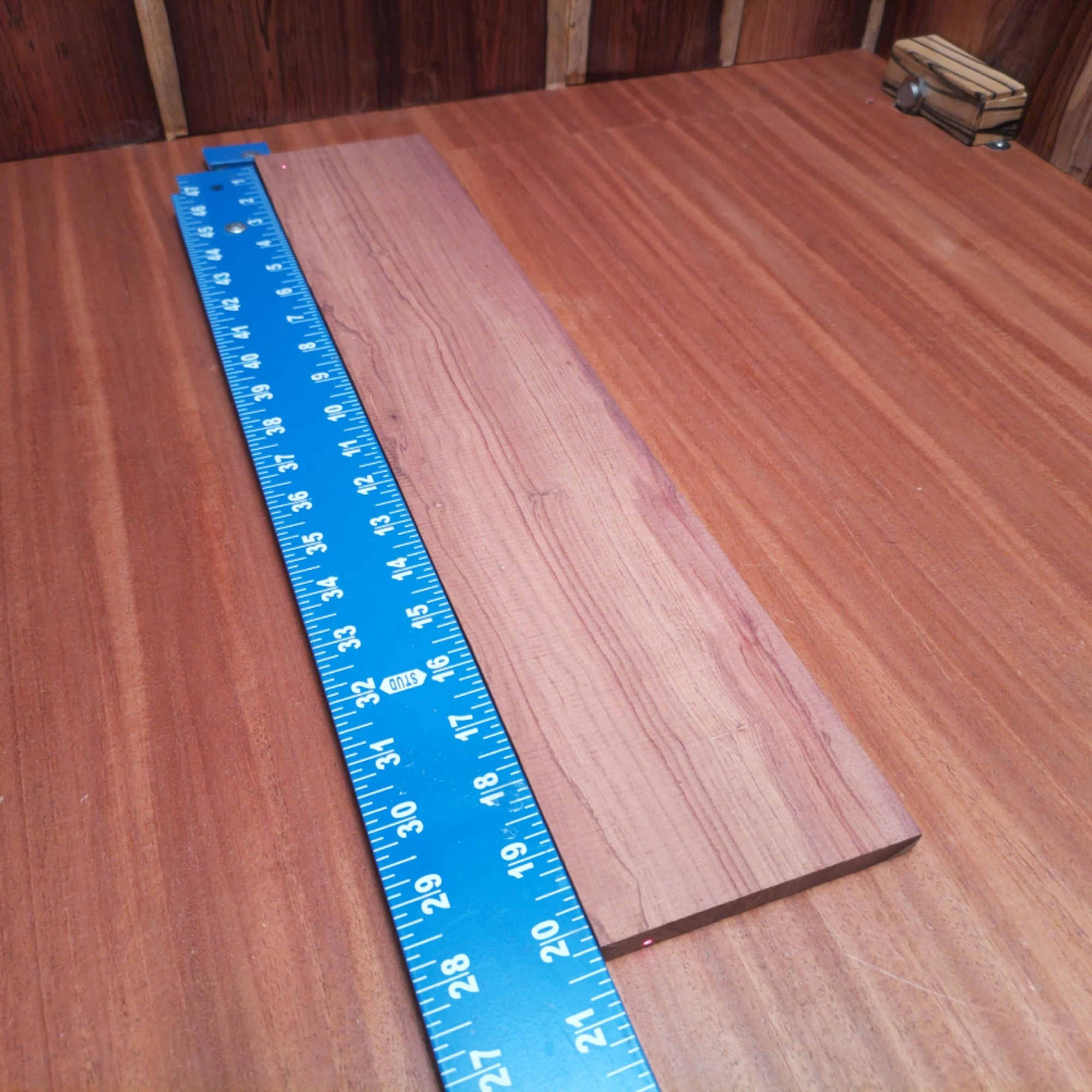 Honduran Rosewood Acoustic Rift Sawn Fingerboard Blank 0.4" X 4.1" X 20.3" - HRAFBR000346 1 Unlock the potential of your next acoustic project with this premium Honduran Rosewood blank. Offering stunning tonal qualities and a beautiful grain, this rift sawn wood is perfect for luthiers seeking durability and richness of sound. The ideal dimensions make it easy to work with, ensuring your fingerboards will shine. Craft with confidence and let your creativity soar! It is a Honduran Rosewood Acoustic Rift Sawn fingerboard blank with dimensions of 20.3 x 4.1 x 0.4 inches.