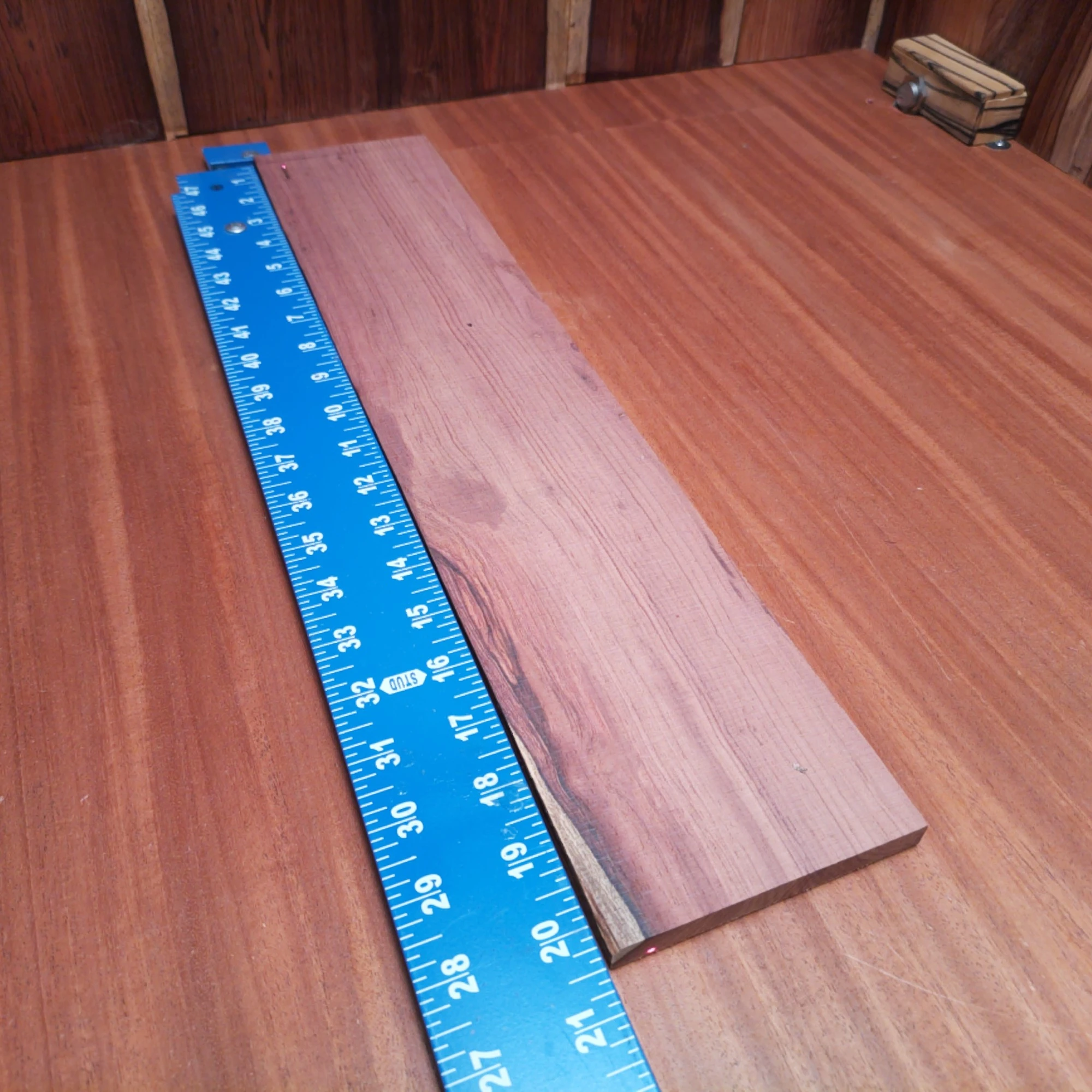 Honduran Rosewood Acoustic Rift Sawn Fingerboard Blank 0.4" X 4.1" X 20.3" - HRAFBR000346 2 Unlock the potential of your next acoustic project with this premium Honduran Rosewood blank. Offering stunning tonal qualities and a beautiful grain, this rift sawn wood is perfect for luthiers seeking durability and richness of sound. The ideal dimensions make it easy to work with, ensuring your fingerboards will shine. Craft with confidence and let your creativity soar! It is a Honduran Rosewood Acoustic Rift Sawn fingerboard blank with dimensions of 20.3 x 4.1 x 0.4 inches.