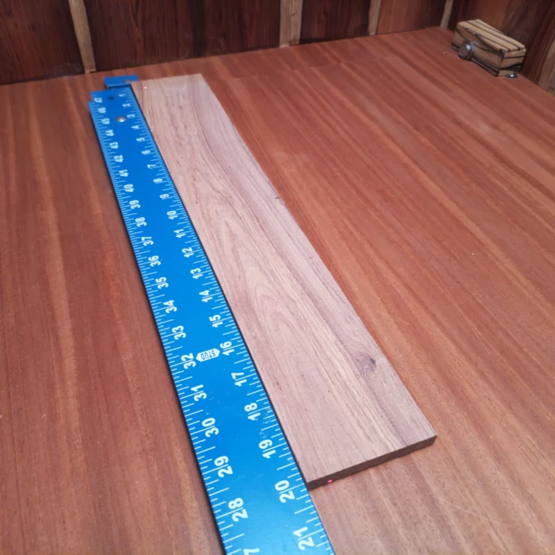 Elevate your instruments with our Honduran Rosewood blank. Perfect for luthiers looking to create stunning acoustic pieces, this premium-grade wood offers rich tonal properties and remarkable aesthetics. With its rift sawn cut, you can expect stability and beauty, making it ideal for high-quality guitar projects or unique soundboards. Unleash your creativity and craft instruments your customers will cherish! It is a Honduran Rosewood Acoustic Rift Sawn fingerboard blank with dimensions of 20.0 x 3.3 x 0.4 inches.
