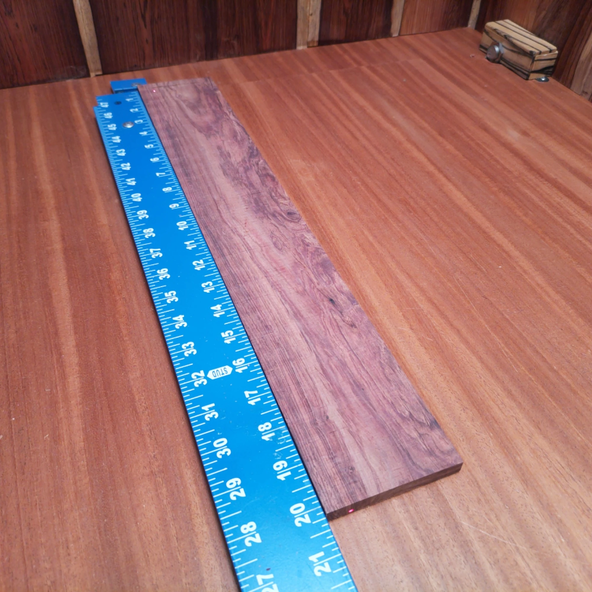 Honduran Rosewood Acoustic Rift Sawn Fingerboard Blank 0.4" X 3.1" X 20.2" - HRAFBR000352 2 Unlock your creative potential with this premium Honduran Rosewood fingerboard blank. Perfect for crafting exquisite acoustics, its dense grain brings a rich sound and stunning appearance to your projects. Its generous size provides ample material for luthiers seeking both beauty and durability. Upgrade your guitar-making game and resonate with quality! It is a Honduran Rosewood Acoustic Rift Sawn fingerboard blank with dimensions of 20.2 x 3.1 x 0.4 inches.
