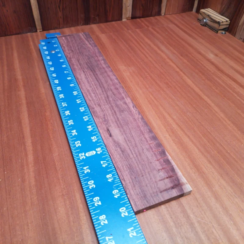Discover the rich tones and vibrant character of our Honduran Rosewood blanks. Perfect for luthiers looking to create impressive acoustic instruments, this rift-sawn piece offers both durability and stunning aesthetics. Whether shaping it into a guitar body or intricate details, this versatile wood is sure to deliver exceptional sound quality and playability. Elevate your craft with this wood, where beauty meets functionality! It is a Honduran Rosewood Acoustic Rift Sawn fingerboard blank with dimensions of 20.2 x 3.4 x 0.4 inches.