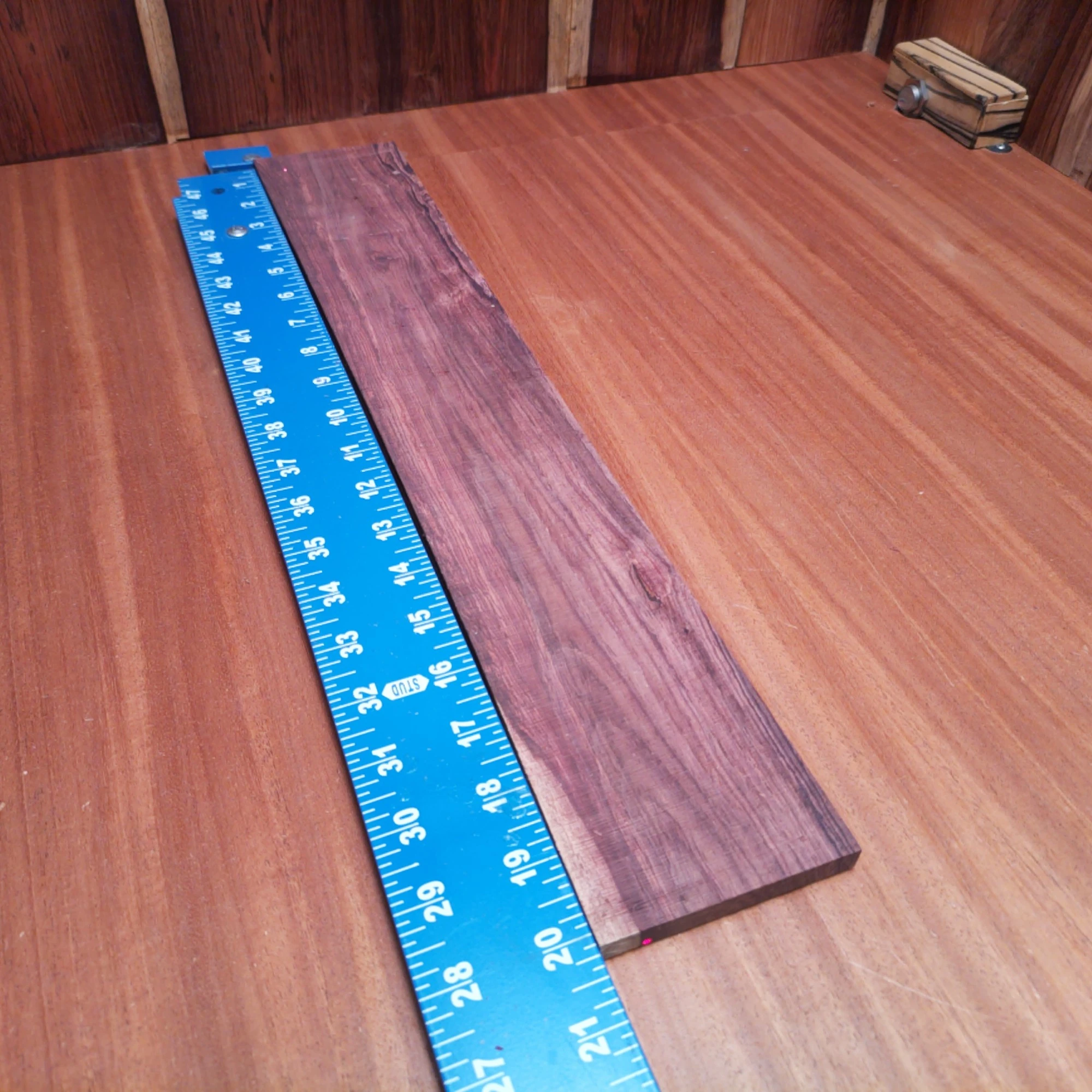 Honduran Rosewood Acoustic Rift Sawn Fingerboard Blank 0.4" X 3.4" X 20.2" - HRAFBR000355 2 Discover the rich tones and vibrant character of our Honduran Rosewood blanks. Perfect for luthiers looking to create impressive acoustic instruments, this rift-sawn piece offers both durability and stunning aesthetics. Whether shaping it into a guitar body or intricate details, this versatile wood is sure to deliver exceptional sound quality and playability. Elevate your craft with this wood, where beauty meets functionality! It is a Honduran Rosewood Acoustic Rift Sawn fingerboard blank with dimensions of 20.2 x 3.4 x 0.4 inches.