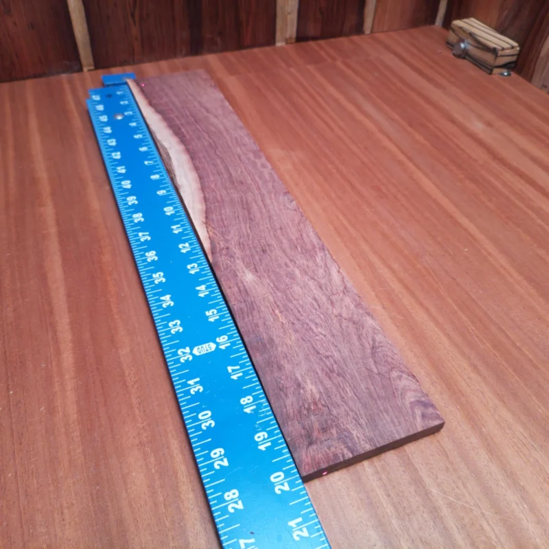 Unlock your creativity with this premium Honduran Rosewood blank, crafted specifically for luthiers. Its rift-sawn grain pattern ensures stunning aesthetics while providing excellent tonal qualities. Ideal for creating beautiful acoustic instruments, this versatile blank helps you achieve that perfect sound with ease, all while adding a touch of elegance to your projects. Get ready to elevate your craftsmanship with this exceptional wood choice! It is a Honduran Rosewood Acoustic Rift Sawn fingerboard blank with dimensions of 20.1 x 3.7 x 0.4 inches.
