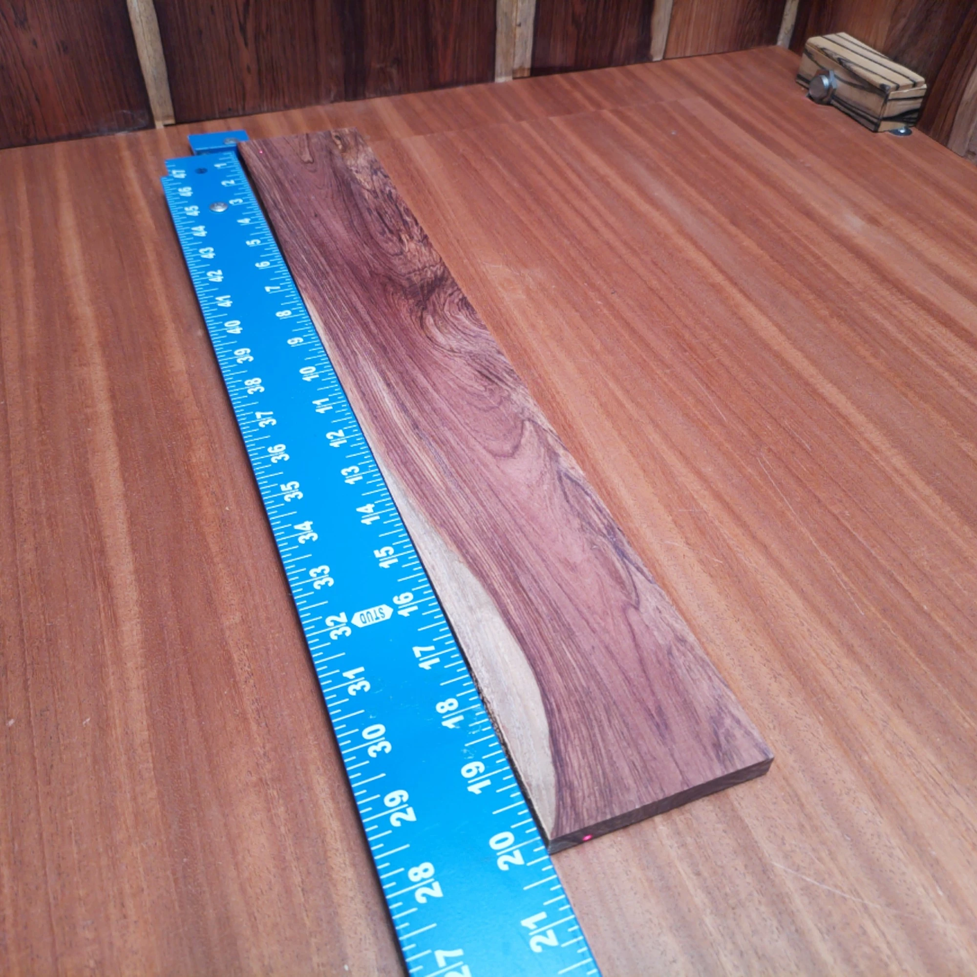 Honduran Rosewood Acoustic Rift Sawn Fingerboard Blank 0.4" X 3.2" X 20.1" - HRAFBR000360 1 Get ready to elevate your acoustic projects with our Honduran Rosewood fingerboards blank, designed for luthiers who crave quality. This premium wood offers rich tonal qualities and an attractive grain pattern, ensuring your instruments will shine both visually and sonically. Perfect for creating beautiful, resonant soundboards or stunning fingerboards, it is a must-have for any serious luthier or woodworker looking to enhance their craft. It is a Honduran Rosewood Acoustic Rift Sawn fingerboard blank with dimensions of 20.1 x 3.2 x 0.4 inches.