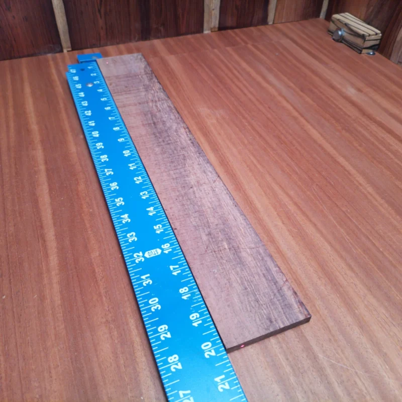 Fingerboard Blanks 39 Elevate your next acoustic project with this stunning Honduran rosewood blank, perfect for luthiers. Its rich, dark tones not only enhance sound quality but also add an aesthetic flair to your instruments. With exceptional workability, this blank is designed for those who appreciate the delicate craftsmanship of guitar building. Transform your designs and let the music flow with this premium fingerboards blank! It is a Honduran Rosewood Acoustic Rift Sawn fingerboard blank with dimensions of 20.1 x 2.9 x 0.3 inches.