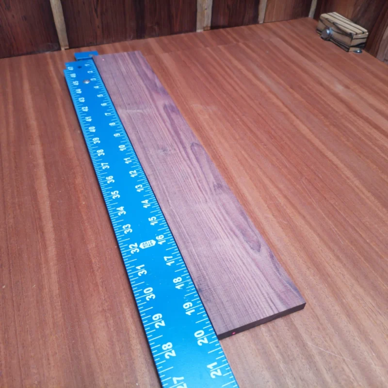 Elevate your luthiery game with this stunning Honduran Rosewood blank. Perfectly rift sawn, it boasts rich tones and attractive grain patterns that will shine in your acoustic projects. Whether you're crafting a guitar or enhancing your existing designs, this versatile wood ensures optimal resonance and a gorgeous finish. Experience the satisfaction of building with quality that resonates in every note! It is a Honduran Rosewood Acoustic Rift Sawn fingerboard blank with dimensions of 20.1 x 3.2 x 0.4 inches.