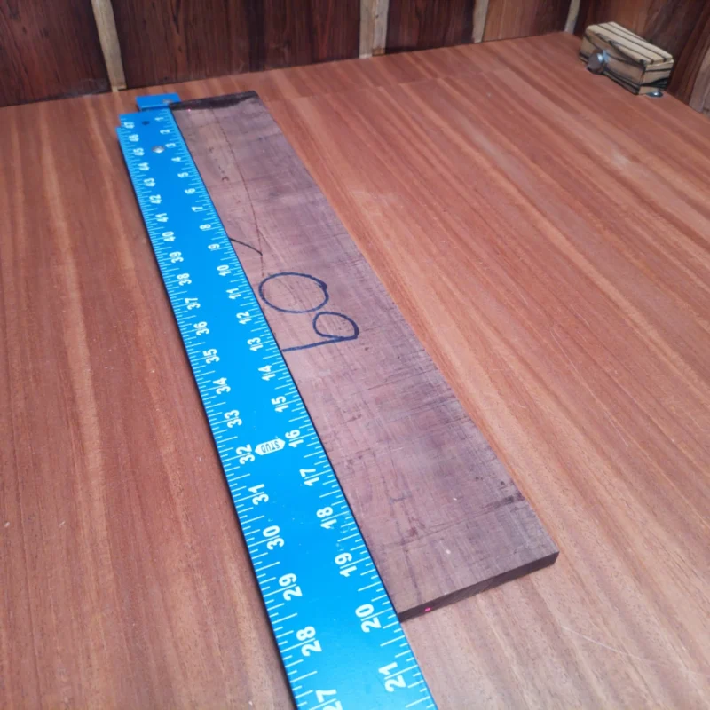 Elevate your luthiery game with this stunning Honduran Rosewood blank. Perfectly rift sawn, it boasts rich tones and attractive grain patterns that will shine in your acoustic projects. Whether you're crafting a guitar or enhancing your existing designs, this versatile wood ensures optimal resonance and a gorgeous finish. Experience the satisfaction of building with quality that resonates in every note! It is a Honduran Rosewood Acoustic Rift Sawn fingerboard blank with dimensions of 20.1 x 3.2 x 0.4 inches.