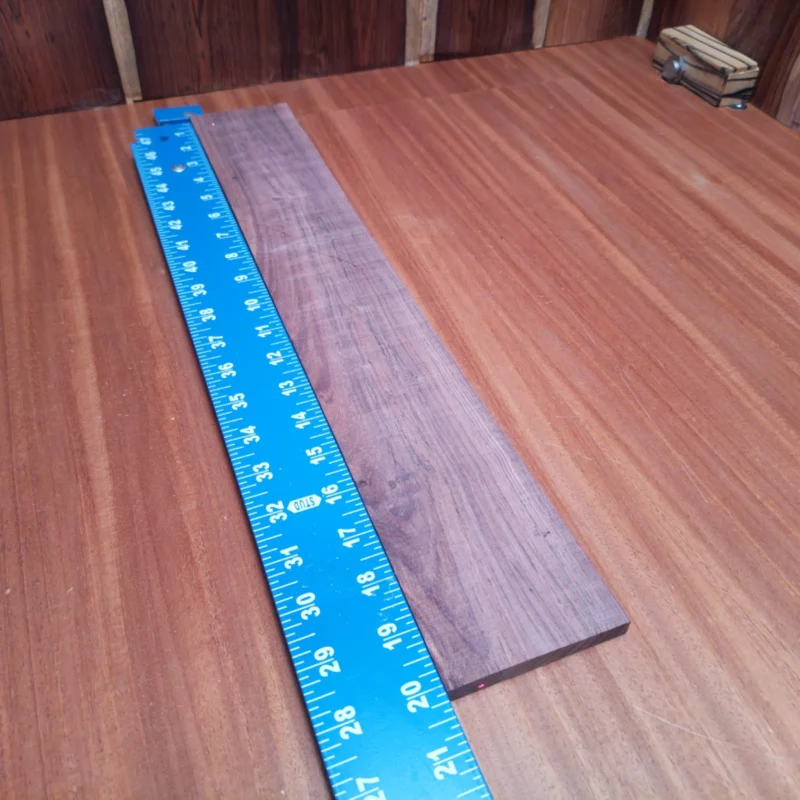 Perfect for luthiers, this Honduran Rosewood blank boasts a stunning natural grain, ideal for acoustics! Measuring a convenient size, it allows for easy handling and versatile crafting. Elevate your guitar projects with this durable and resilient wood, known for its rich tone and beautiful finish. Whether you're an experienced builder or a passionate hobbyist, this fingerboard blank is a must-have in your workshop! It is a Honduran Rosewood Acoustic Rift Sawn fingerboard blank with dimensions of 20.1 x 3.1 x 0.3 inches.