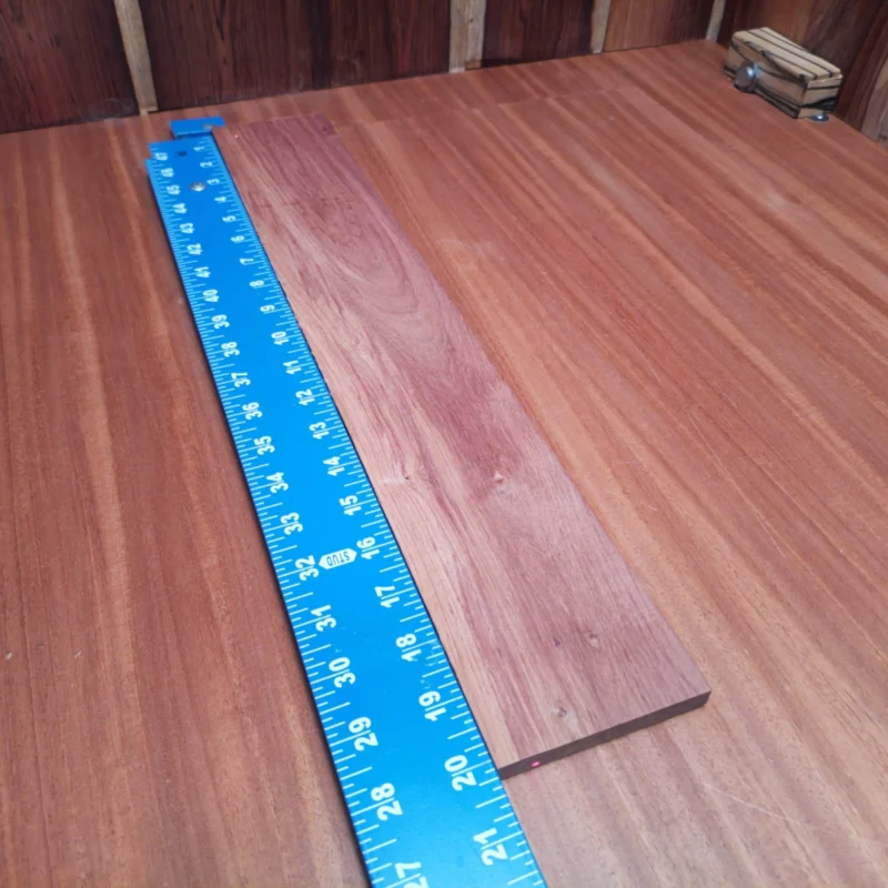 This Honduran Rosewood fingerboard blank is a luthier's dream! Measuring 0.4" x 3.3" x 20.1", it offers the perfect balance of durability and beauty. Its rich color and fine grain increase tonal clarity and resonance in your stringed instruments. Elevate your craftsmanship with this stunning, high-quality wood that guitarists will love and appreciate! It is a Honduran Rosewood Acoustic Rift Sawn fingerboard blank with dimensions of 20.1 x 3.3 x 0.4 inches.