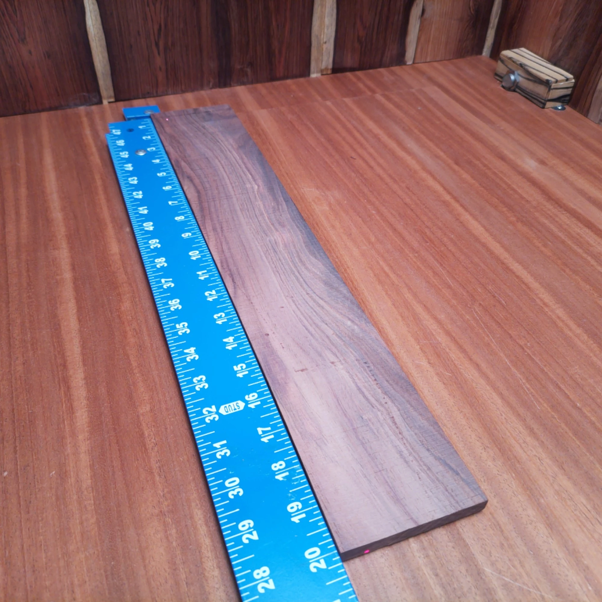 Honduran Rosewood Acoustic Rift Sawn Fingerboard Blank 0.3" X 3.4" X 20.0" - HRAFBR000382 1 Introducing the ultimate fingerboards blank made from Honduran Rosewood! Perfect for luthiers looking to create that ideal tonal balance, this rift-sawn beauty features stunning durability and a tight, uniform grain. Enhance your acoustic instruments with beautifully crafted fingerboards that ensure a smooth player experience. Get ready to impress your clients and elevate your craft with this high-quality material! It is a Honduran Rosewood Acoustic Rift Sawn fingerboard blank with dimensions of 20.0 x 3.4 x 0.3 inches.