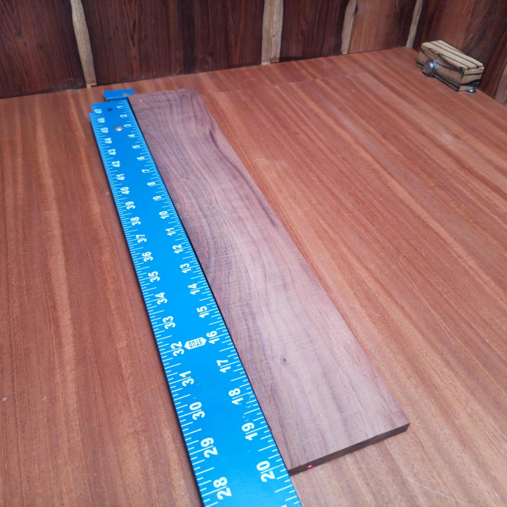 Honduran Rosewood Acoustic Rift Sawn Fingerboard Blank 0.3" X 3.4" X 20.0" - HRAFBR000382 2 Introducing the ultimate fingerboards blank made from Honduran Rosewood! Perfect for luthiers looking to create that ideal tonal balance, this rift-sawn beauty features stunning durability and a tight, uniform grain. Enhance your acoustic instruments with beautifully crafted fingerboards that ensure a smooth player experience. Get ready to impress your clients and elevate your craft with this high-quality material! It is a Honduran Rosewood Acoustic Rift Sawn fingerboard blank with dimensions of 20.0 x 3.4 x 0.3 inches.
