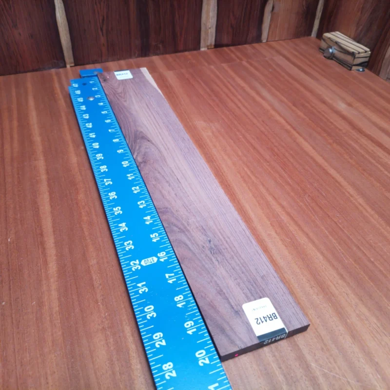 Craft your next acoustic masterpiece with this Honduran Rosewood blank. Known for its rich tonal qualities and stunning appearance, this rift sawn wood is perfect for luthiers seeking durability and elegance in their instruments. Its unique grain patterns not only enhance the aesthetics but also contribute to superior sound projection. This blank measures 0.4