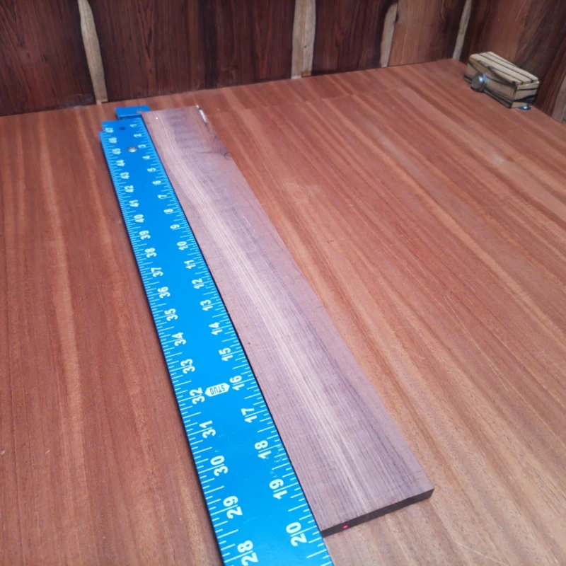 Fingerboard Blanks 98 Unlock the potential of your next acoustic project with this premium Honduran Rosewood blank. Not only does it offer a stunning visual appeal, but its powerful tonal properties enhance resonance and projection for an unparalleled playing experience. Perfect for luthiers seeking high-quality materials, this fingerboard blank is a game-changer in both sound and style. Upgrade your instruments with this reliable and beautiful choice for any acoustic guitar. It is a Honduran Rosewood Acoustic Rift Sawn fingerboard blank with dimensions of 20.0 x 2.7 x 0.4 inches.