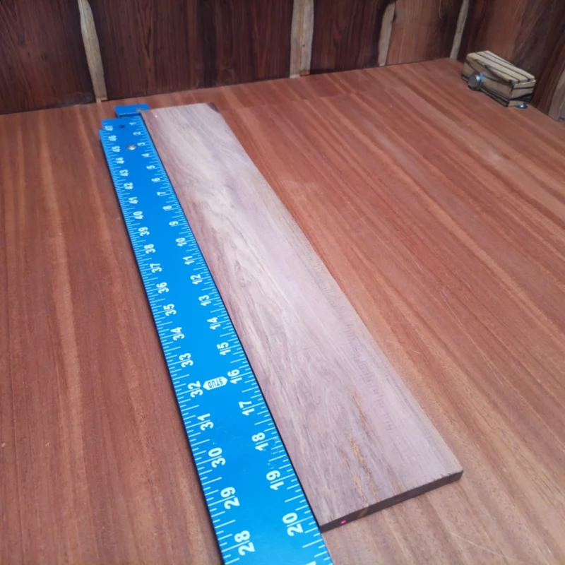 Crafted from premium Honduran rosewood, this blank is perfect for luthiers seeking quality. Its fine grain and rich color make it a top choice for creating striking acoustic instruments. With excellent tonal properties and stability, this blank will help you achieve remarkable resonance. Whether you're a seasoned luthier or a passionate hobbyist, this fingerboard blank promises to elevate your next project to new heights. It is a Honduran Rosewood Acoustic Rift Sawn fingerboard blank with dimensions of 20.2 x 3.4 x 0.4 inches.