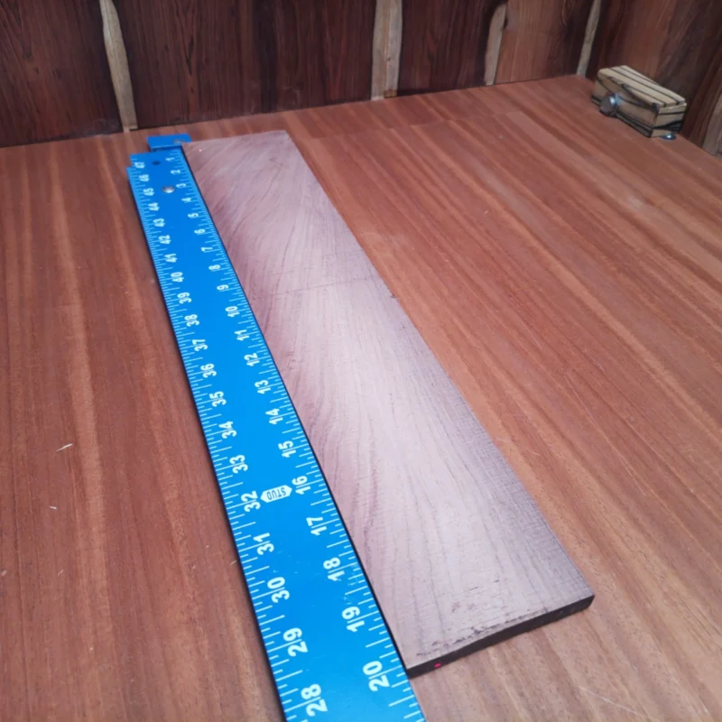 Discover the beauty of Honduran Rosewood with this fingerboard blank, perfect for luthiers. This premium quality blank offers brilliant tonal characteristics and dense durability, ensuring your acoustic instruments resonate beautifully. Ideal for crafting guitars that demand both aesthetic appeal and superb sound production, this blank is a reliable choice for your next masterpiece. Transform your creations with this eye-catching, high-performance wood. It is a Honduran Rosewood Acoustic Rift Sawn fingerboard blank with dimensions of 20.1 x 3.8 x 0.4 inches.