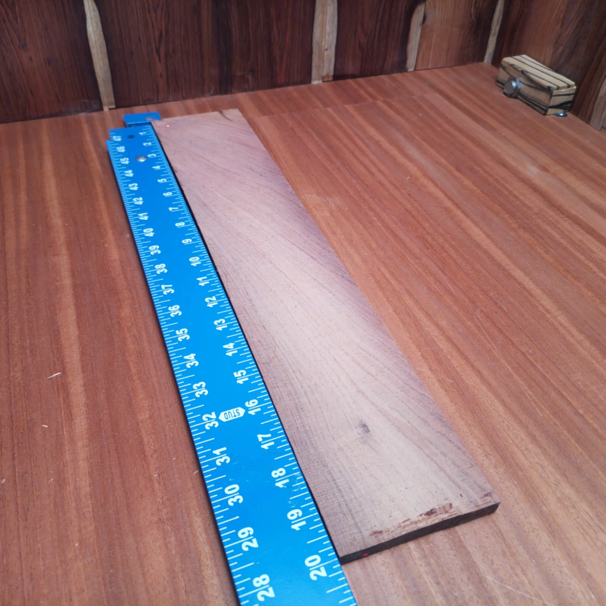 Honduran Rosewood Acoustic Rift Sawn Fingerboard Blank 0.4" X 3.8" X 20.1" - HRAFBR000475 2 Discover the beauty of Honduran Rosewood with this fingerboard blank, perfect for luthiers. This premium quality blank offers brilliant tonal characteristics and dense durability, ensuring your acoustic instruments resonate beautifully. Ideal for crafting guitars that demand both aesthetic appeal and superb sound production, this blank is a reliable choice for your next masterpiece. Transform your creations with this eye-catching, high-performance wood. It is a Honduran Rosewood Acoustic Rift Sawn fingerboard blank with dimensions of 20.1 x 3.8 x 0.4 inches.