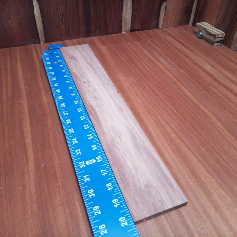 Fingerboard Blanks 52 Crafted for luthiers, this Honduran Rosewood blank is perfect for acoustic instruments. Its rich tones and striking grain patterns will elevate your creations. This fingerboard blank offers superior durability and stability, making it ideal for building a lasting masterpiece. Get ready to unleash your creativity and enhance your sound with this high-quality material! It is a Honduran Rosewood Acoustic Rift Sawn fingerboard blank with dimensions of 20.1 x 3.2 x 0.3 inches.