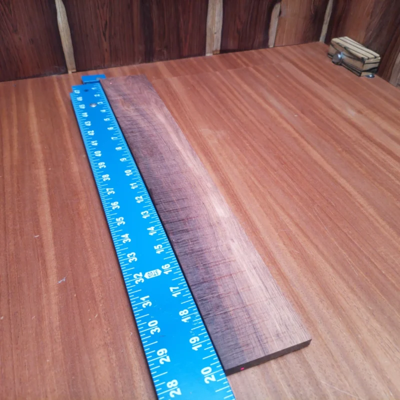 Unlock the rich tones of your music with this Honduran Rosewood fingerboard blank! Known for its vibrant sound, this rift-sawn beauty offers remarkable resonance and stunning grain patterns. Ideal for crafting exquisite acoustic instruments, it showcases the perfect blend of durability and aesthetic appeal. Whether you're an experienced luthier or a passionate hobbyist, this fingerboard blank will elevate your creations to the next level! It is a Honduran Rosewood Acoustic Rift Sawn fingerboard blank with dimensions of 20.1 x 3.0 x 0.4 inches.