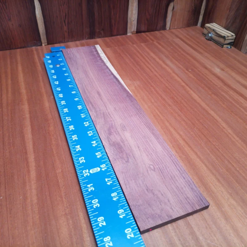 Crafted from top-quality Honduran rosewood, this fingerboard blank brings both beauty and durability to your creations. With its striking grain patterns and smooth finish, it's perfect for luthiers seeking to enhance acoustic instruments. The size makes it versatile for various projects, allowing for creativity without limits. Transform your designs with this exceptional material that resonates well and looks stunning. It is a Honduran Rosewood Acoustic Rift Sawn fingerboard blank with dimensions of 20.0 x 3.9 x 0.4 inches.