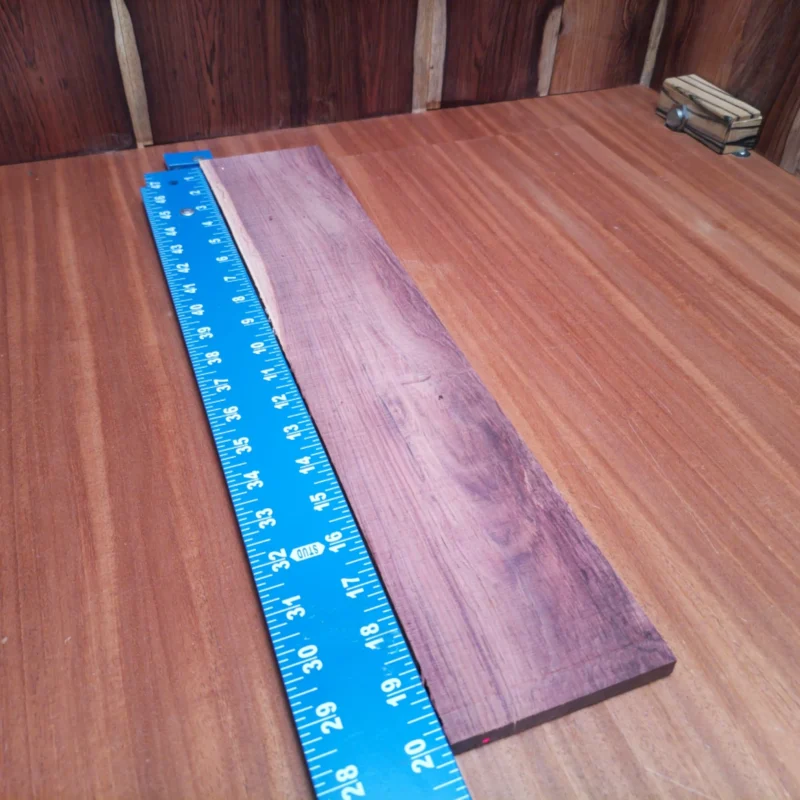 Crafted from top-quality Honduran rosewood, this fingerboard blank brings both beauty and durability to your creations. With its striking grain patterns and smooth finish, it's perfect for luthiers seeking to enhance acoustic instruments. The size makes it versatile for various projects, allowing for creativity without limits. Transform your designs with this exceptional material that resonates well and looks stunning. It is a Honduran Rosewood Acoustic Rift Sawn fingerboard blank with dimensions of 20.0 x 3.9 x 0.4 inches.