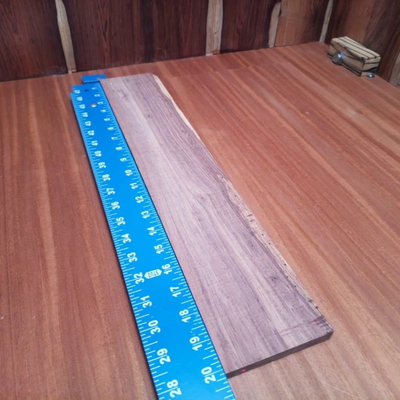 Unlock your luthiery potential with this premium Honduran Rosewood blank! Perfect for crafting exquisite fingerboards, its stunning grain and dynamic tones will elevate your builds. With a rich resonance that's second to none, this blank is not just a piece of wood; it's your ticket to creating sonic masterpieces. Whether you're a seasoned pro or a DIY enthusiast, our high-quality blank ensures both durability and beauty in every strum or pick. It is a Honduran Rosewood Acoustic Rift Sawn fingerboard blank with dimensions of 20.1 x 3.6 x 0.4 inches.