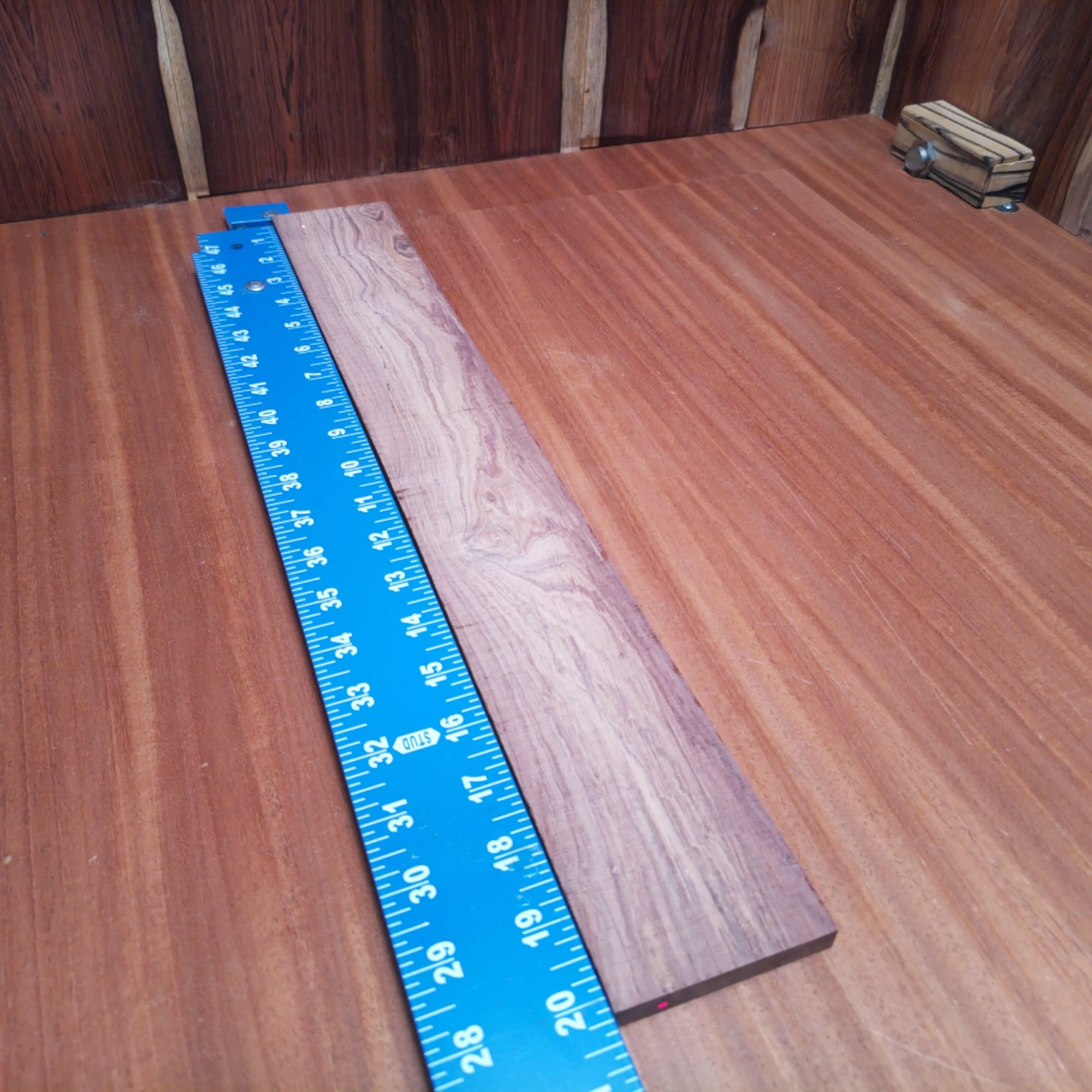 Honduran Rosewood Acoustic Rift Sawn Fingerboard Blank 0.4" X 2.8" X 20.2" - HRAFBR000532 1 Unleash your creativity with our Honduran Rosewood fingerboards blank. This premium wood delivers beautiful tonal qualities, perfect for luthiers wanting to craft stunning acoustic guitars. Its lustrous grain adds a touch of elegance, while its stability ensures durability in any project. Get ready to enhance your instrument with this reliable and stylish blank that meets all your luthier needs. It is a Honduran Rosewood Acoustic Rift Sawn fingerboard blank with dimensions of 20.2 x 2.8 x 0.4 inches.