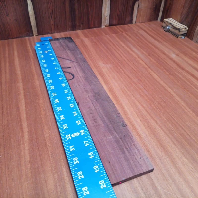 Crafted from high-quality Honduran Rosewood, this fingerboards blank is ideal for luthiers. With its rift sawn profile, it offers excellent stability and resonates beautifully, elevating any acoustic guitar project. Measure twice and shape once with wood that's easy to work with and stands the test of time. Make your next build a masterpiece with this stunning blank! It is a Honduran Rosewood Acoustic Rift Sawn fingerboard blank with dimensions of 20.2 x 2.9 x 0.4 inches.