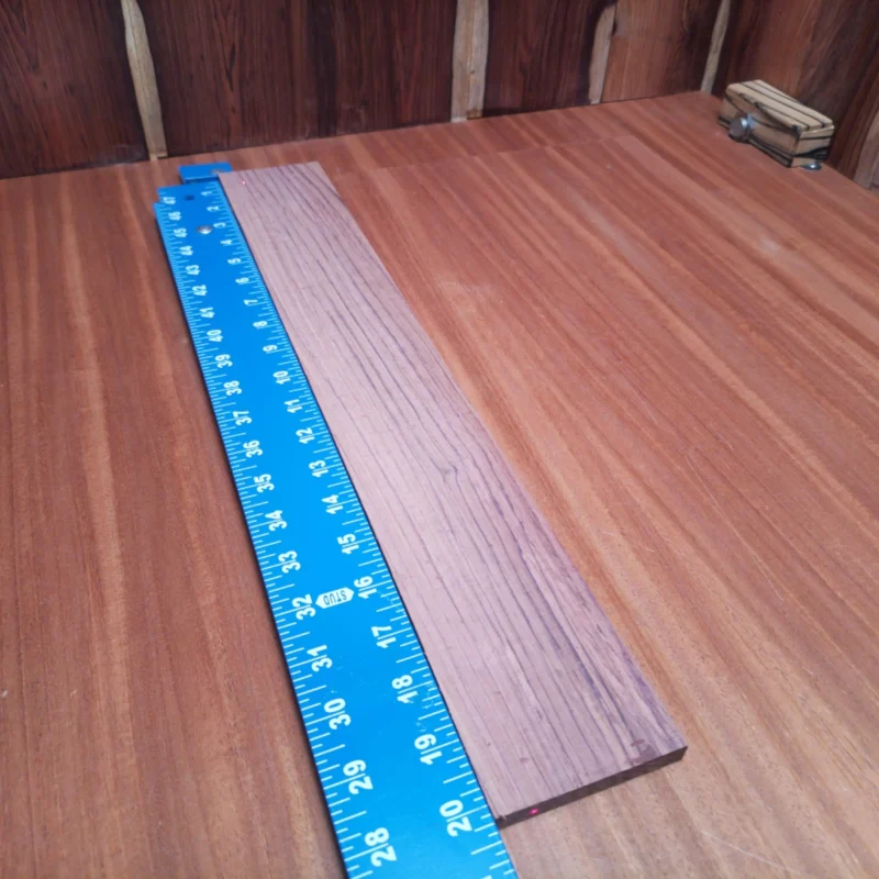 Discover the quality of this Honduran Rosewood fingerboards blank! Perfectly rift sawn, it's designed to deliver superb tonal clarity and stunning aesthetics. Luthiers will appreciate its durability and fine grain pattern, making each instrument unique. Elevate your guitar building game and impress your players with a blank that speaks to both sound quality and style. It is a Honduran Rosewood Acoustic Rift Sawn fingerboard blank with dimensions of 20.2 x 3.0 x 0.4 inches.