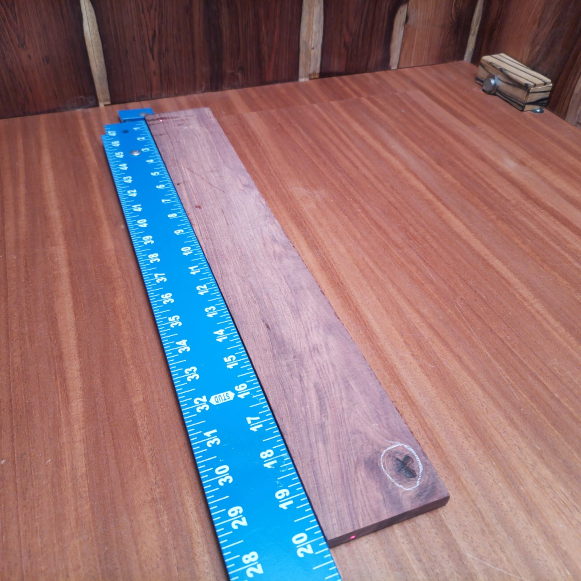 Honduran Rosewood Acoustic Rift Sawn Fingerboard Blank 0.4" X 2.9" X 20.1" - HRAFBR000593 1 Crafted from premium Honduran rosewood, this fingerboard blank is perfect for luthiers looking to create stunning acoustic instruments. Its rift sawn profile provides stability, while the rich, warm tones enhance the sound quality. Bring your guitar project to life with this top-quality blank that’s both visually appealing and play-ready. Upgrade your instrument creation with a timeless wood that combines beauty and functionality! It is a Honduran Rosewood Acoustic Rift Sawn fingerboard blank with dimensions of 20.1 x 2.9 x 0.4 inches.