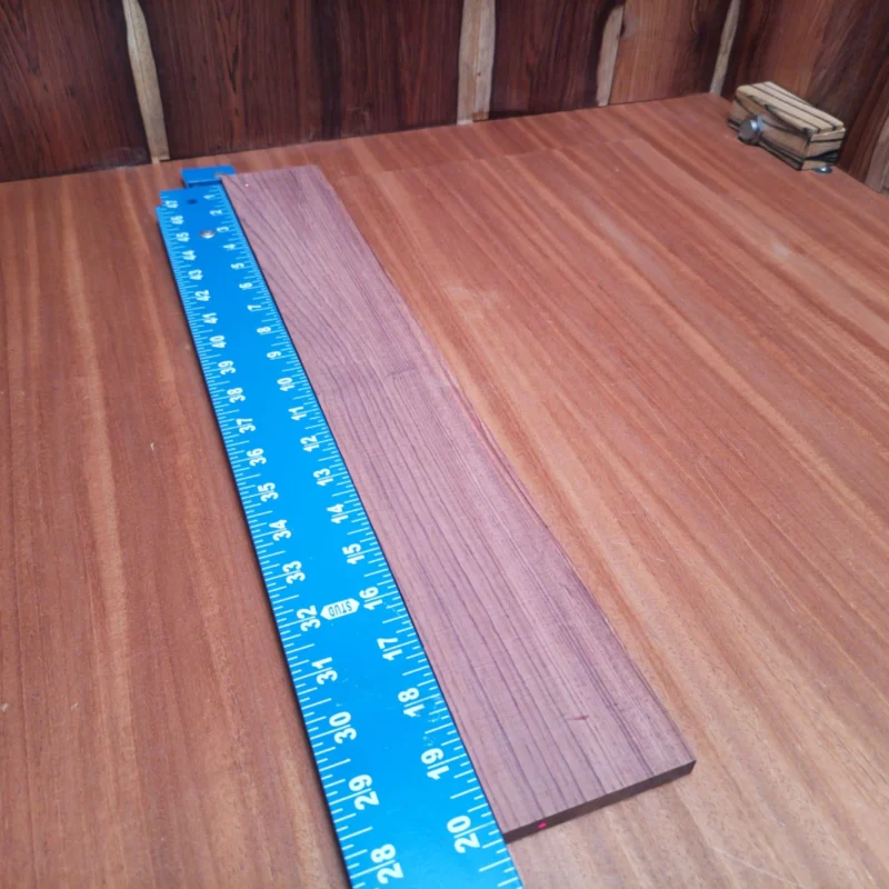 Discover the beauty of Honduran Rosewood with this premium acoustic fingerboards blank. Perfectly rift sawn and expertly crafted, it provides luthiers with a stunning material that enhances both tone and aesthetics. The rich, warm hues and tight grain of this fingerboard make it an ideal choice for creating exceptional instruments, bringing your musical creations to life. Embrace the craftsmanship potential of this exquisite blank and elevate your projects to the next level! It is a Honduran Rosewood Acoustic Rift Sawn fingerboard blank with dimensions of 20.1 x 2.9 x 0.4 inches.