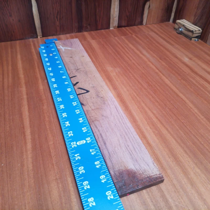 Honduran Rosewood Acoustic Rift Sawn Fingerboard Blank 0.4" X 2.9" X 20.2" - HRAFBR000597 3 Unlock your creativity with this premium Honduran Rosewood fingerboard blank! Perfect for luthiers, this stunning wood offers rich tonal qualities and durability. Its rift-sawn grain enhances stability and aesthetics, making it an ideal choice for your next project. Upgrade your instrument with this unique material for exquisite sound and flawless performance. Get ready to elevate your craftsmanship with this must-have fingerboard blank! It is a Honduran Rosewood Acoustic Rift Sawn fingerboard blank with dimensions of 20.2 x 2.9 x 0.4 inches.