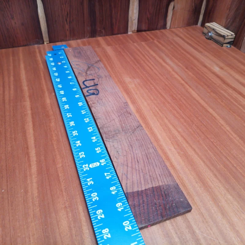 Honduran Rosewood Acoustic Rift Sawn Fingerboard Blank 0.3" X 2.9" X 20.3" - HRAFBR000598 3 Unlock your creativity with this premium Honduran Rosewood fingerboard blank, perfect for luthiers. Known for its rich tonal quality and stunning grain, it will elevate your acoustic projects. The dense structure ensures durability, while the rift sawn cut provides a beautiful, uniform appearance. Ideal for crafting unique instruments that resonate beautifully, this blank is a must-have for any serious woodworker. It is a Honduran Rosewood Acoustic Rift Sawn fingerboard blank with dimensions of 20.3 x 2.9 x 0.3 inches.
