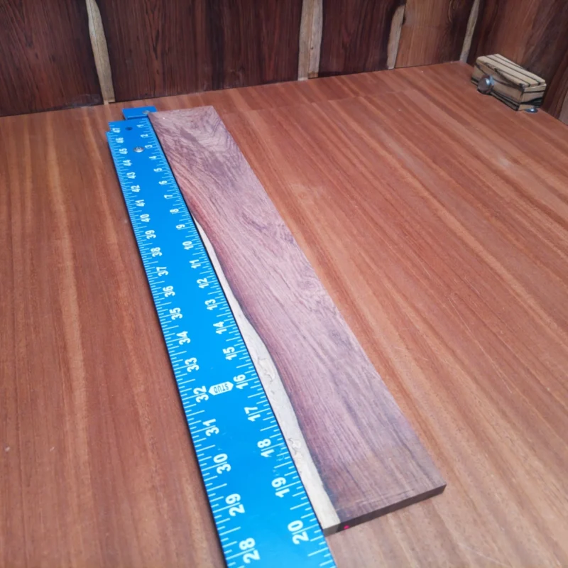 Unlock your creativity with this Honduran Rosewood blank, perfect for stunning acoustic instruments. Its rift sawn finish ensures a consistent grain, offering not only aesthetic appeal but also tonal richness. Ideal for luthiers seeking durability and an eye-catching look, this blank is sure to inspire your next project. Whether you’re crafting a guitar or ukulele, master craftsmanship is at your fingertips! It is a Honduran Rosewood Acoustic Rift Sawn fingerboard blank with dimensions of 20.1 x 3.0 x 0.4 inches.