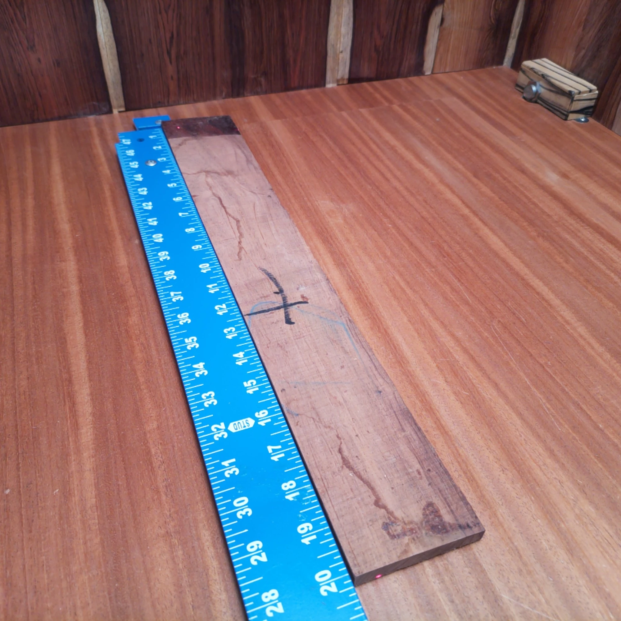 Honduran Rosewood Acoustic Rift Sawn Fingerboard Blank 0.4" X 2.9" X 20.1" - HRAFBR000609 2 Transform your instruments with our stunning Honduran Rosewood blank. Perfect rift sawn for easy handling, it offers exceptional tonal properties that every luthier craves. This durable wood not only enhances sound quality but also adds a rich aesthetic appeal to your acoustic builds. Elevate your craftsmanship with the timeless beauty and reliability of this fingerboard blank, designed to meet both functional and artistic needs. It is a Honduran Rosewood Acoustic Rift Sawn fingerboard blank with dimensions of 20.1 x 2.9 x 0.4 inches.