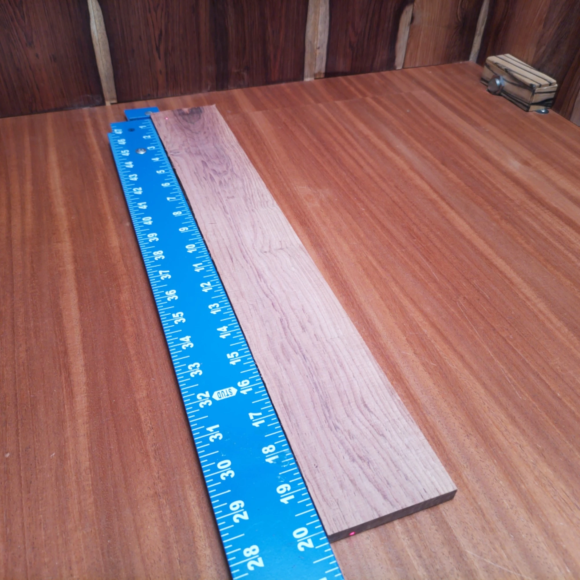 Honduran Rosewood Acoustic Rift Sawn Fingerboard Blank 0.4" X 3.0" X 20.2" - HRAFBR000613 2 Unlock your creativity with this premium Honduran Rosewood blank, perfect for crafting exquisite guitars. With its rich tonal character and beautiful rift-sawn grain, this fingerboard is designed to elevate instrument playing and aesthetic appeal. Whether you're an experienced luthier or a passionate hobbyist, this blank is your next step toward creating a show-stopping acoustic masterpiece. Get ready to impress musicians and audiences alike with your high-quality craftsmanship! It is a Honduran Rosewood Acoustic Rift Sawn fingerboard blank with dimensions of 20.2 x 3.0 x 0.4 inches.