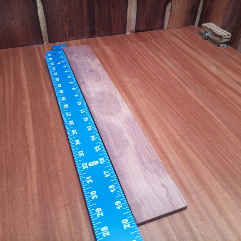 Unlock your creativity with this rift-sawn Honduran Rosewood fingerboards blank. Perfect for luthiers, its rich tonal qualities and beautiful grain will elevate your acoustic projects. Whether you're crafting a stunning guitar or enhancing an existing instrument, this blank provides the stability and beauty you need. Enjoy working with one of the finest woods that offers durability and an unforgettable sound. Get ready to impress with your craftsmanship! It is a Honduran Rosewood Acoustic Rift Sawn fingerboard blank with dimensions of 20.2 x 2.9 x 0.4 inches.
