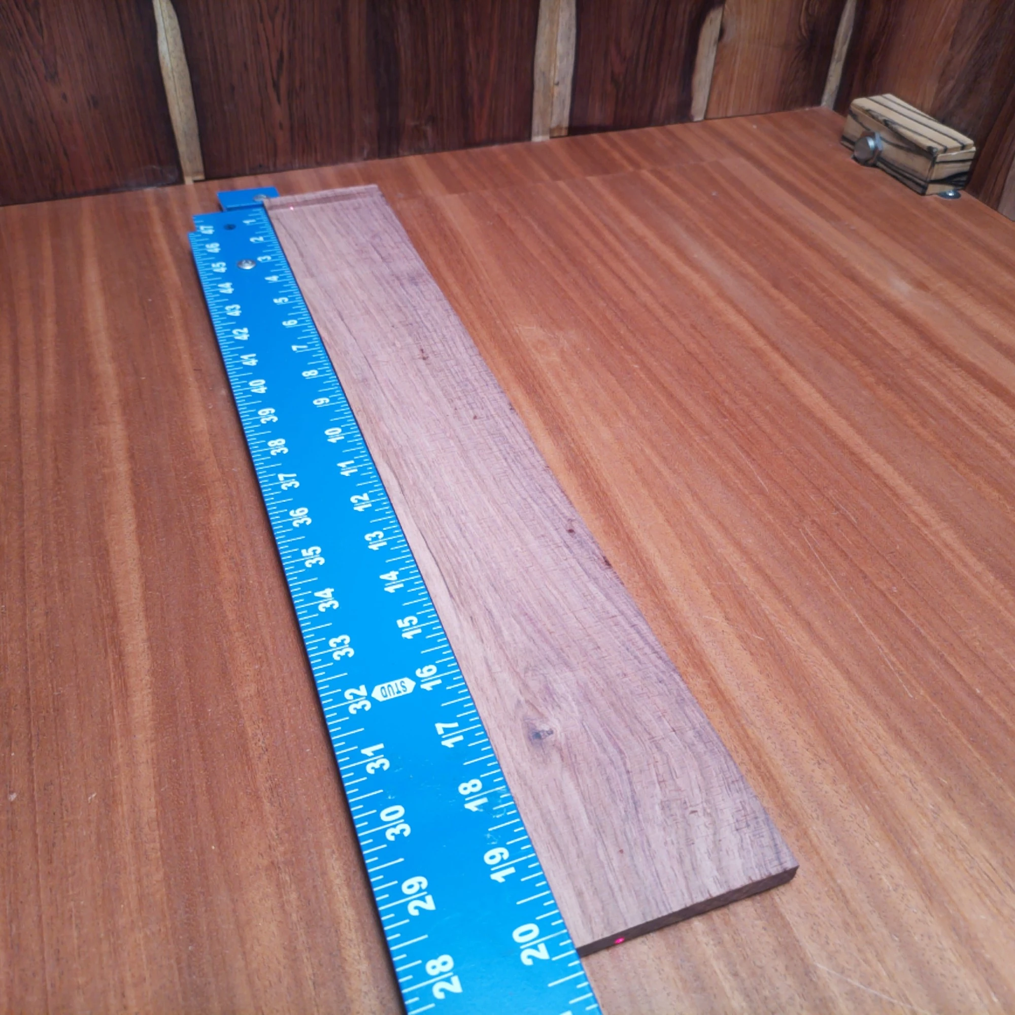 Honduran Rosewood Acoustic Rift Sawn Fingerboard Blank 0.3" X 2.9" X 20.2" - HRAFBR000630 1 Elevate your craftsmanship with this Honduran Rosewood fingerboards blank. Known for its unique tonal qualities and stunning appearance, this rift sawn wood is ideal for luthiers looking to create distinguished acoustic instruments. Its durability ensures a long-lasting performance, while the natural beauty of the grain adds character to any project. Get ready to impress with a fingerboard that enhances both the feel and sound of your instrument! It is a Honduran Rosewood Acoustic Rift Sawn fingerboard blank with dimensions of 20.2 x 2.9 x 0.4 inches.