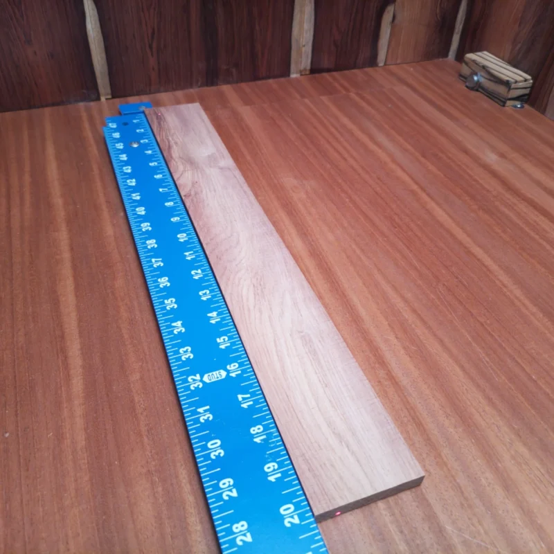 Fingerboard Blanks 81 Elevate your luthier skills with this Honduran Rosewood blank! It's perfect for crafting beautiful acoustic instruments, boasting a rich, warm tone that stands out. This rift-sawn wood ensures stability and a stunning appearance for your next guitar or project. Create your masterpiece with ease and confidence using this top-quality fingerboards blank, combining compelling aesthetics and professional-grade performance. It is a Honduran Rosewood Acoustic Rift Sawn fingerboard blank with dimensions of 20.2 x 2.5 x 0.4 inches.