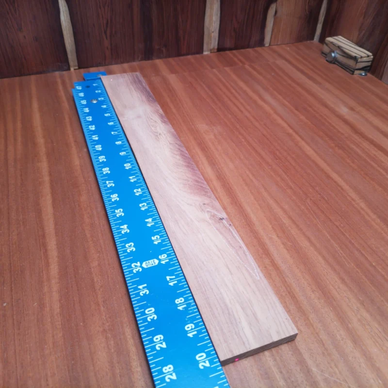 Elevate your luthier skills with this Honduran Rosewood blank! It's perfect for crafting beautiful acoustic instruments, boasting a rich, warm tone that stands out. This rift-sawn wood ensures stability and a stunning appearance for your next guitar or project. Create your masterpiece with ease and confidence using this top-quality fingerboards blank, combining compelling aesthetics and professional-grade performance. It is a Honduran Rosewood Acoustic Rift Sawn fingerboard blank with dimensions of 20.2 x 2.5 x 0.4 inches.