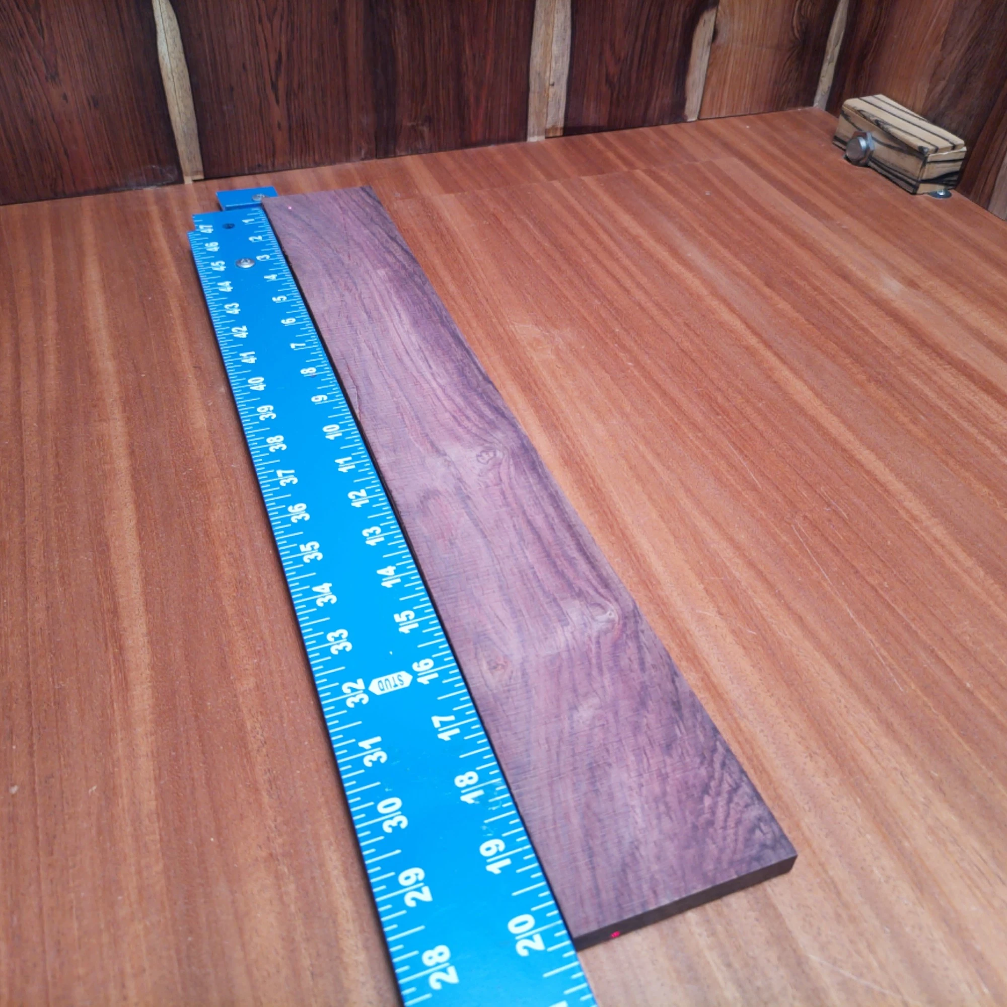 Honduran Rosewood Acoustic Rift Sawn Fingerboard Blank 0.4" X 2.9" X 20.2" - HRAFBR000633 1 Discover the beauty of Honduran Rosewood with this versatile fingerboard blank. Ideal for luthiers looking to create stunning acoustic instruments, it's rift sawn for stability and smoothness. Whether crafting a custom guitar or upgrading an old favorite, this quality wood provides a rich tone and warm aesthetics that will impress players. Elevate your luthiery projects and create something unforgettable! It is a Honduran Rosewood Acoustic Rift Sawn fingerboard blank with dimensions of 20.2 x 2.9 x 0.4 inches.