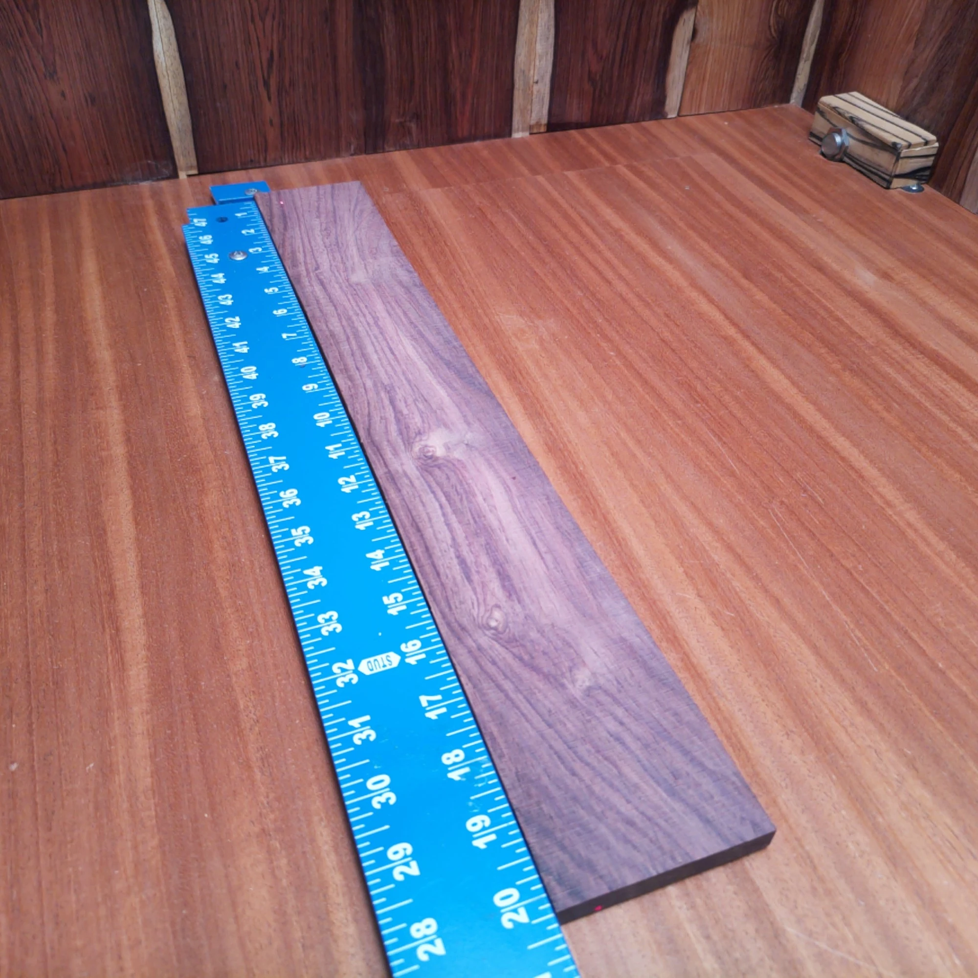 Honduran Rosewood Acoustic Rift Sawn Fingerboard Blank 0.4" X 2.9" X 20.2" - HRAFBR000633 2 Discover the beauty of Honduran Rosewood with this versatile fingerboard blank. Ideal for luthiers looking to create stunning acoustic instruments, it's rift sawn for stability and smoothness. Whether crafting a custom guitar or upgrading an old favorite, this quality wood provides a rich tone and warm aesthetics that will impress players. Elevate your luthiery projects and create something unforgettable! It is a Honduran Rosewood Acoustic Rift Sawn fingerboard blank with dimensions of 20.2 x 2.9 x 0.4 inches.